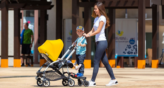 Marche pied poussette